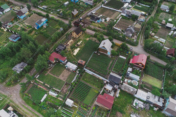 Fototapeta premium Aerial Townscape of Suburban Village Sosnoviy Bor located in Northwestern Russia on the Kola Peninsula near the town Kandalaksha