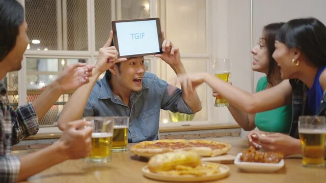 Group of young asian millennial friends join party, hang out, play game have fun moment together feeling happy enjoy laughing sitting at cafe restaurant in asia friendship lifestyle.