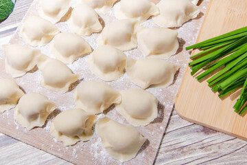The dough is flour and the filling is meat and vegetables.