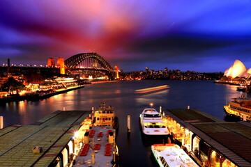 Circular Quay Sydney Australia at night from Circular Quay station. Circular Quay area is a opopular neighborhood for tourism and consists of walk ways, predestrian malls, park