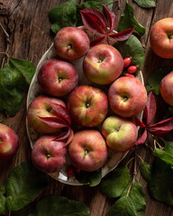 Fresh apples on a plate on a table