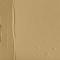 Close up of a light brown vintage rough sheet of carton. Cardboard paper texture with a blank background. Empty papercraft surface. Recycled environmentally friendly material.