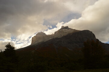 Hiking around the dramatic and windswept mountain landscapes of the Torres del Paine National Park in Patagonia, Chile