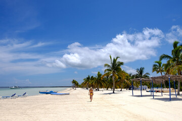 Girl at the beach of Cayo Blanco island in Cuba