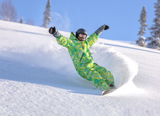 a fun snowboarder with a big mustache blows up a snow powder and raises a beautiful snow cloud....