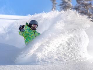 Freerider snowboarder moving down in snow powder. snowboard snow explosion. for a poster and...