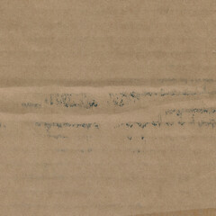 Close up of a light brown vintage rough sheet of carton. Cardboard paper texture with a blank background. Empty papercraft surface. Recycled environmentally friendly material.