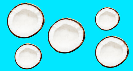 the pattern is juicy and ripe coconut on a turquoise background. Copy-Space top view