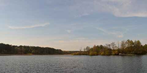 Autumn fishing on the lake, beautiful panorama.