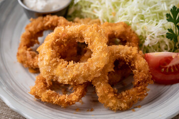 deep fried squid rings with cabbage