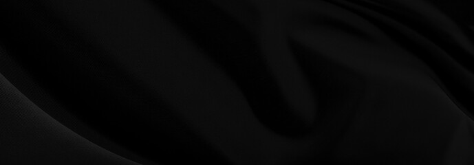 Black gray satin dark fabric texture luxurious shiny that is abstract silk cloth panorama background with patterns soft waves blur beautiful.