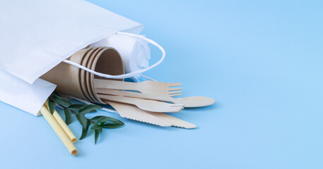 Eco biodegradable tableware and cutlery in paper bag