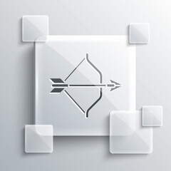 Grey Medieval bow and arrow icon isolated on grey background. Medieval weapon. Square glass panels. Vector.
