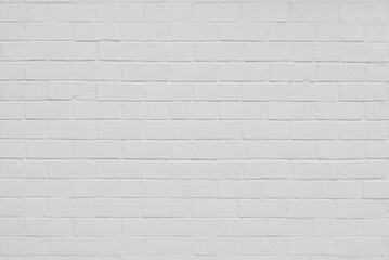 Fototapeta premium Texture of brick wall. new brickwork. Samples of wall or fence are presented at exhibitions. Gray brick close up.