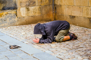 Prague, The Czech Republic: Unidentified beggar on the street.