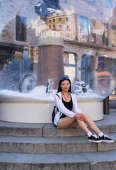 chinese woman and giant snowglobe canada