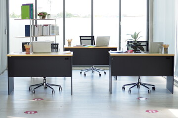 Modern office design with tables and chairs for working in the room