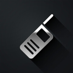 Silver Walkie talkie icon isolated on black background. Portable radio transmitter icon. Radio transceiver sign. Long shadow style. Vector.