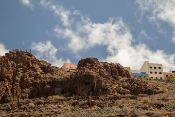 Colorful houses on a hill under the blue sky in San Sebastian, La Gomera, Canary islands