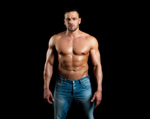 Fototapeta na wymiar Topless shirtless male model. Naked bodybuilder. Handsome masculine man on black.