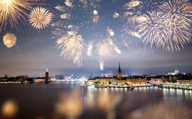 Beautiful Gamla Stan in Stockholm at new year's eve with magical fireworks. 