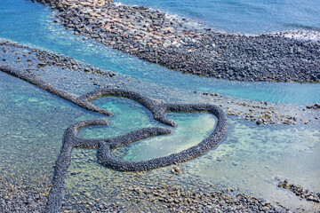 Twin-Hearts Stone Weir is a famous landmark in Qimei Town, Penghu County, Taiwan 澎湖 雙心石滬