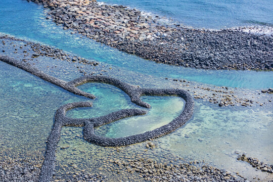 Twin-Hearts Stone Weir is a famous landmark in Qimei Town, Penghu County, Taiwan 澎湖 雙心石滬