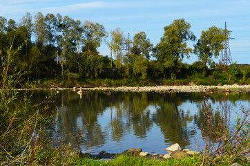 mountain river between sheer cliffs . blue clear water of the river.