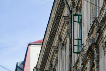 green window and old building in Bucharest, Romania