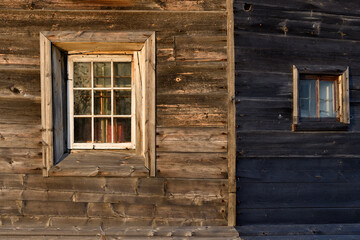 Obraz na płótnie Canvas Windows on the wooden wall. Pomor architecture. Karelia, Russia