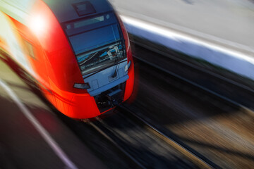 Modern high-speed train in motion, close-up, copy space. Motion Blur