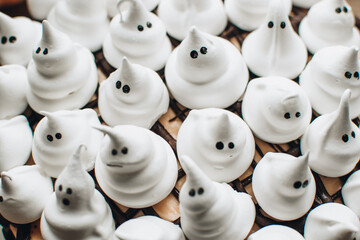 Sweets for halloween party on a wooden table. Halloween style party, candy bar and decorations with...