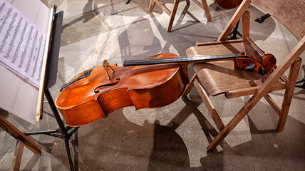 the musical instruments of the symphony orchestra rest before the concert.