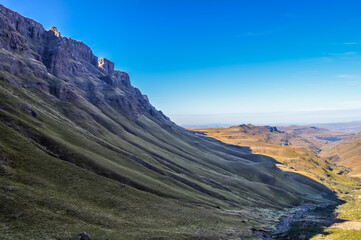 Beautiful and green Sani pass among Drakensberg mountains in Sou