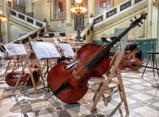 the musical instruments of the symphony orchestra rest before the concert.