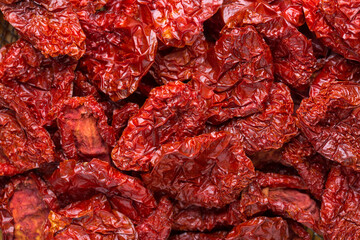 Close-up sun-dried tomatoes. Selective focus. Top view