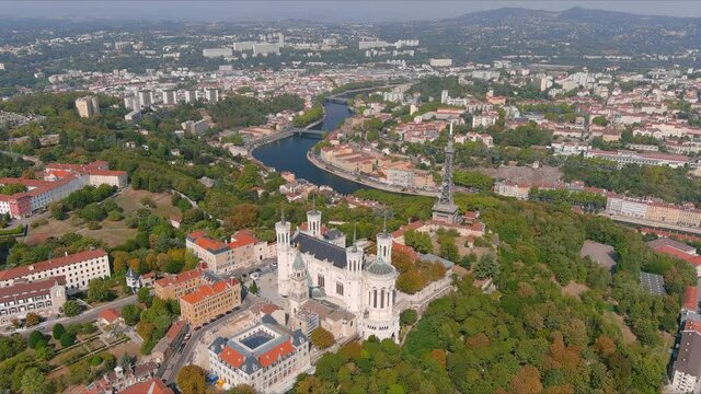 Lyon: Aerial view of historic city with hilltop Basilica of Notre-Dame de Fourvi&egrave;re (La Basilique Notre Dame de Fourvi&egrave;re) - landscape panorama of France from above, Europe