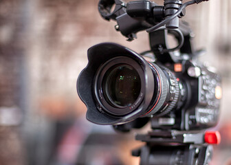 Film industry. detail of Video camera. Broadcasting and Recording with Digital Camera - 384436177