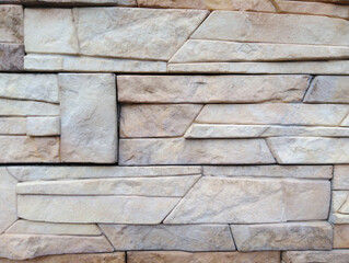 The textured stone background is similar to granite and marble.stone wall.