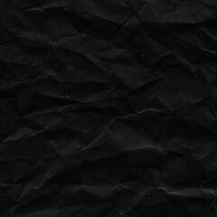 Fototapeta premium Black vintage and old looking crumpled paper background. Retro cardboard texture. Grunge paper for drawing. Ancient book page. Present wrapping.
