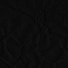 Fototapeta premium Black vintage and old looking crumpled paper background. Retro cardboard texture. Grunge paper for drawing. Ancient book page. Present wrapping.