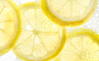 Lemon Slices in water with air bubbles