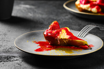 Close up view of baked pears with mascarpone, caramel syrup and strawberry jam