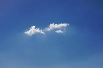 tiny single cloud blue sky minimalist