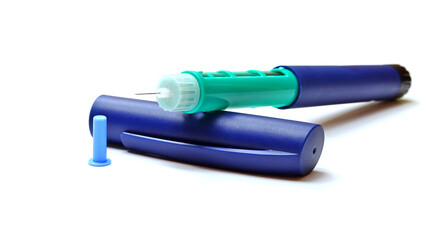 injector pen, insulin pen with open needle, close up, on white background, isolated