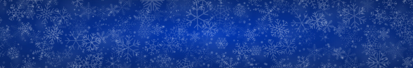Obraz na płótnie Canvas Christmas banner of snowflakes of different shapes, sizes and transparency on blue background