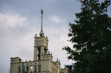 House with a spire in the Stalinist Empire style in the center of kharkov