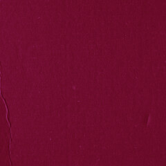 A red vintage rough sheet of carton. Recycled environmentally friendly cardboard paper texture. Simple and bright minimalist papercraft background.