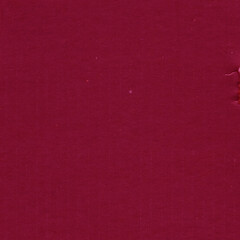 A red vintage rough sheet of carton. Recycled environmentally friendly cardboard paper texture. Simple and bright minimalist papercraft background.