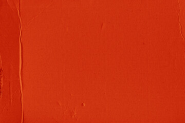 A red vintage rough sheet of carton. Recycled environmentally friendly cardboard paper texture. Simple and bright minimalist papercraft background.
